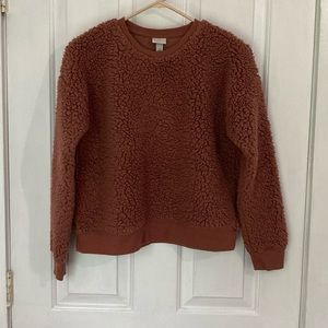 A new day dark tan/burgundy sweater. Size S.